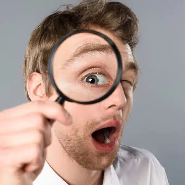 man with magnifying glass