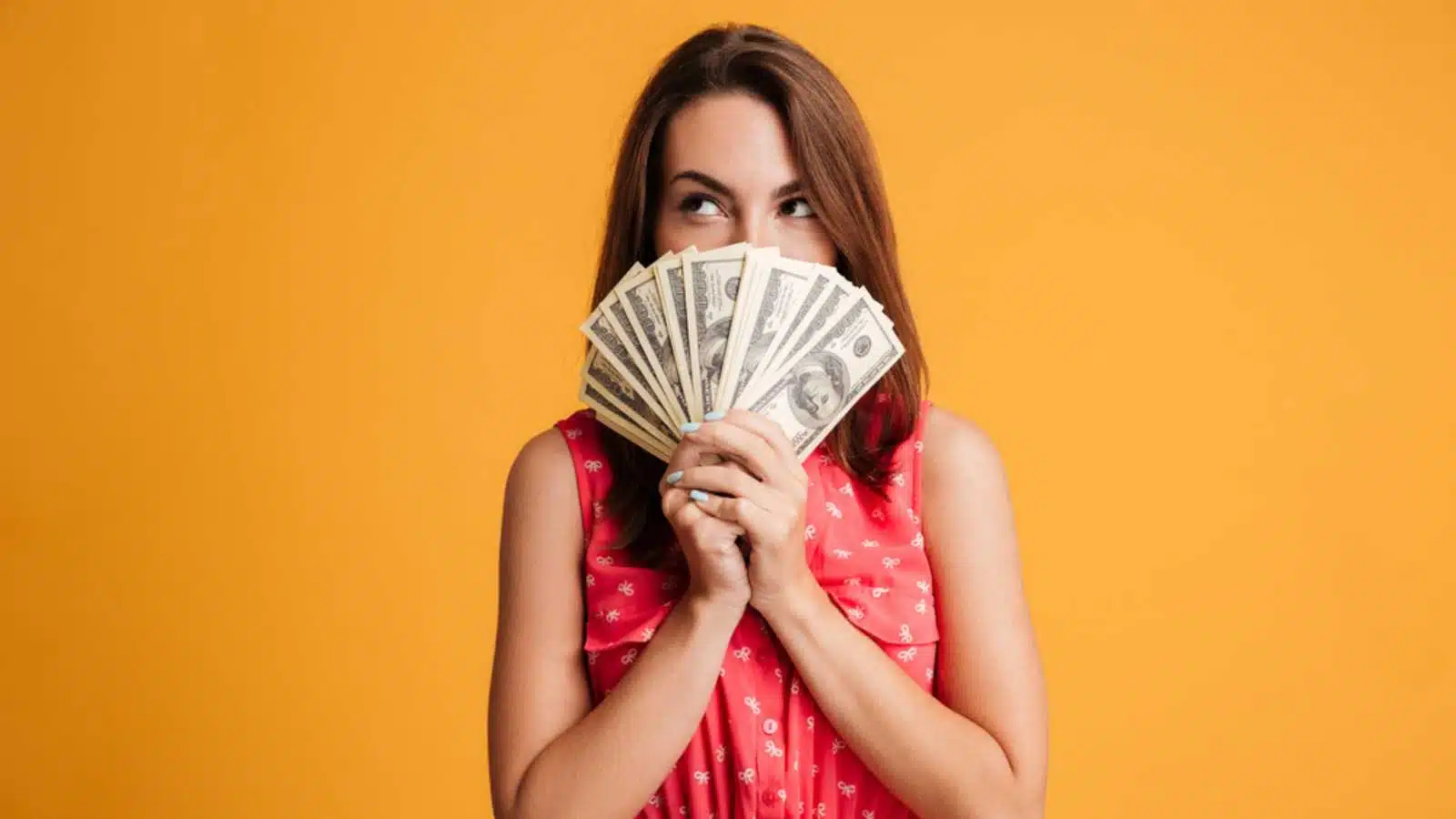 Woman with money closing face
