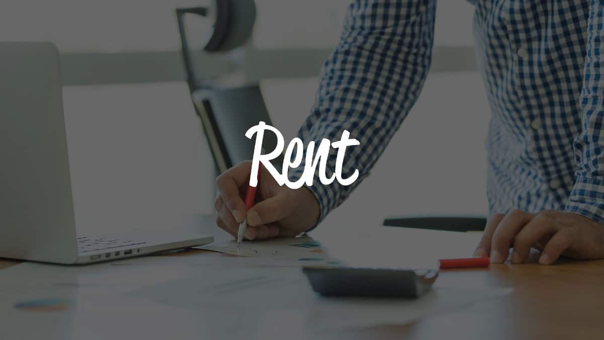 Businessman writing in documents