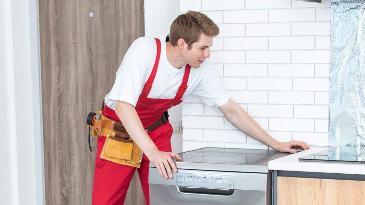 Appliances Most Likely to Fail Repeatedly man dishwasher