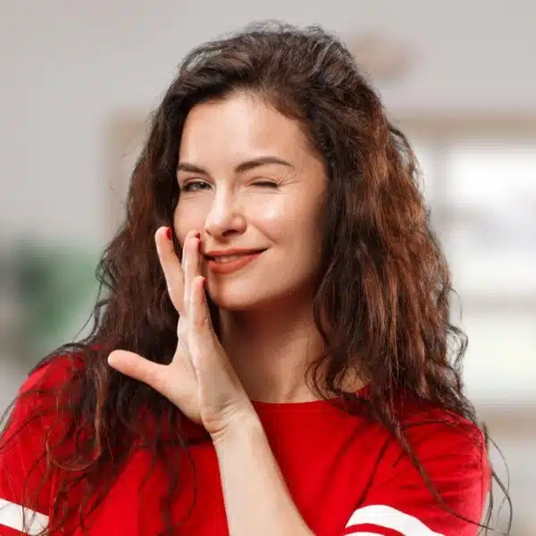 woman telling a secret