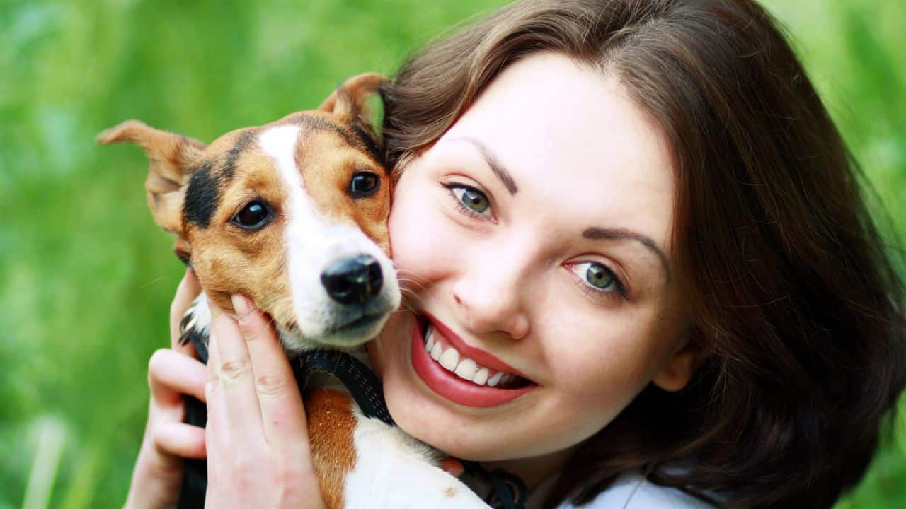 Ways Creators Can Turn Ideas Into Income woman with a dog