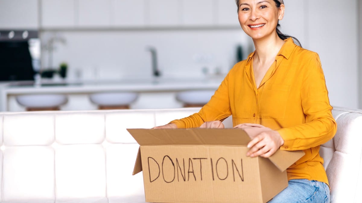 How Oversized Inheritances Create Dependence Donation Concept. Satisfied middle-aged gray-haired woman sitting at h