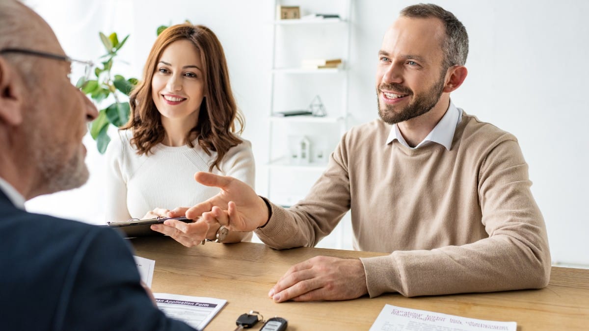 Childhood Habits That Can Shape Your Career Happy man gesturing near woman with clipboard and car dealer