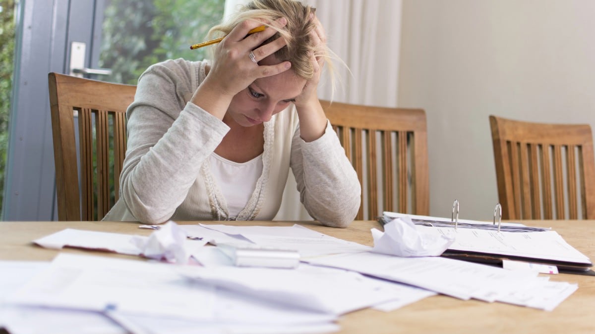 How Oversized Inheritances Create Dependence Woman with financial problems.