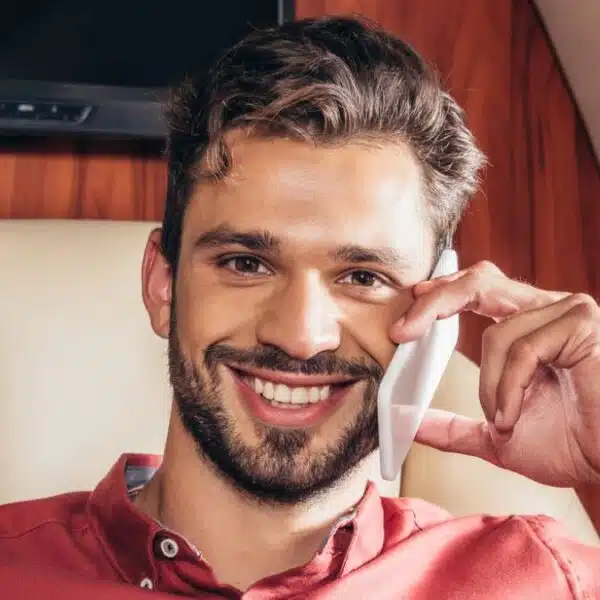 rich man drinking coffee on a plane