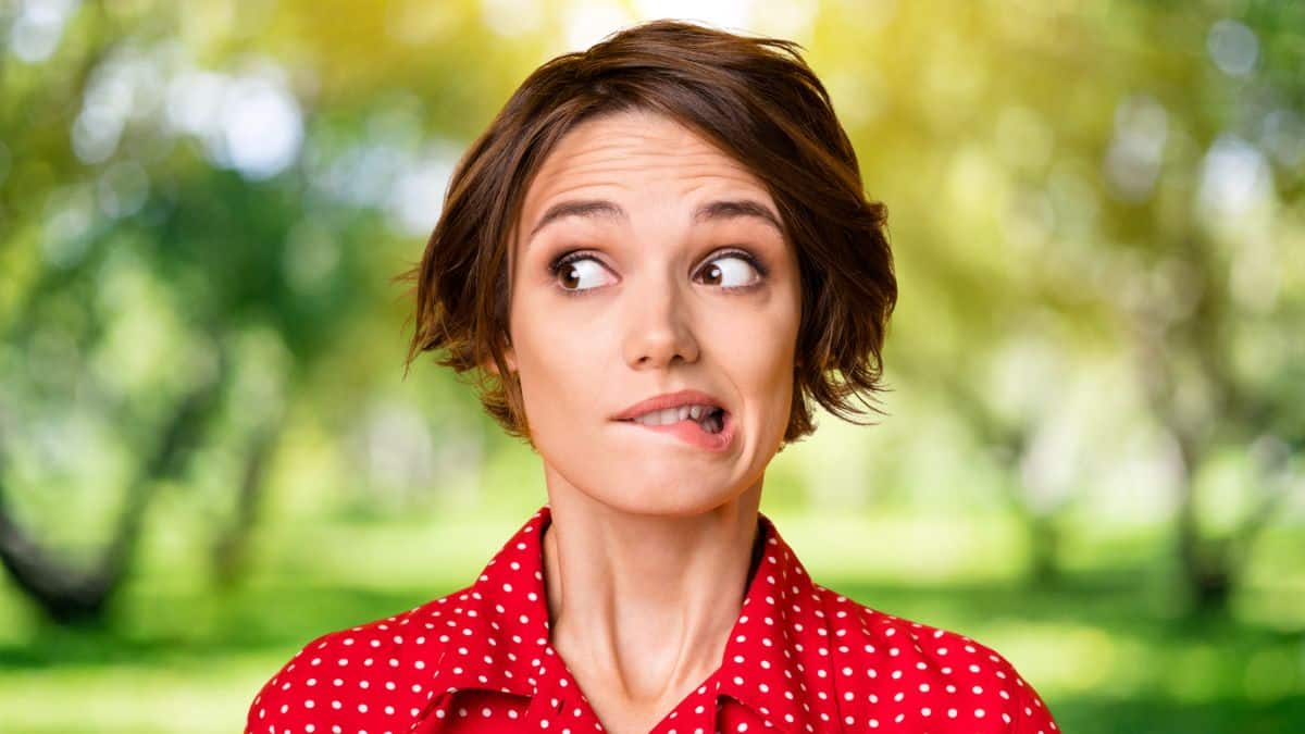 woman with nervous weird face