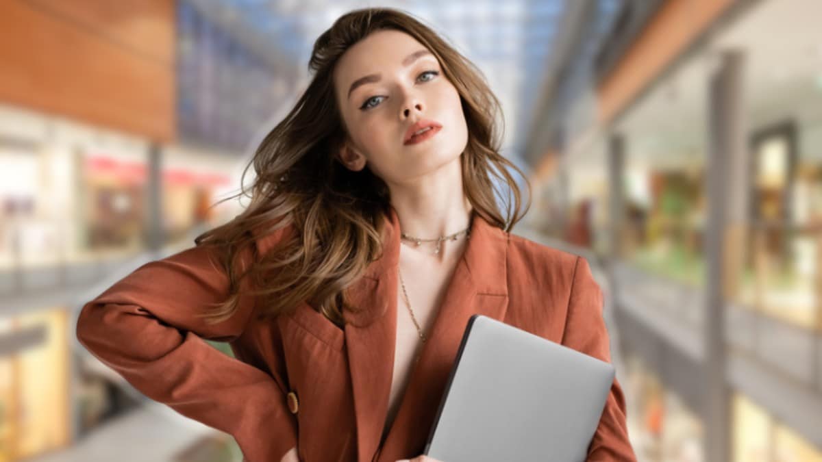 20 Steps to Boost Your Money in Just 12 Months Young girl with laptop