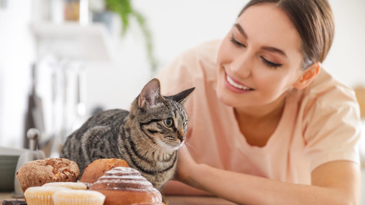 Overlooked Costs Hitting People's Wallet woman with cat