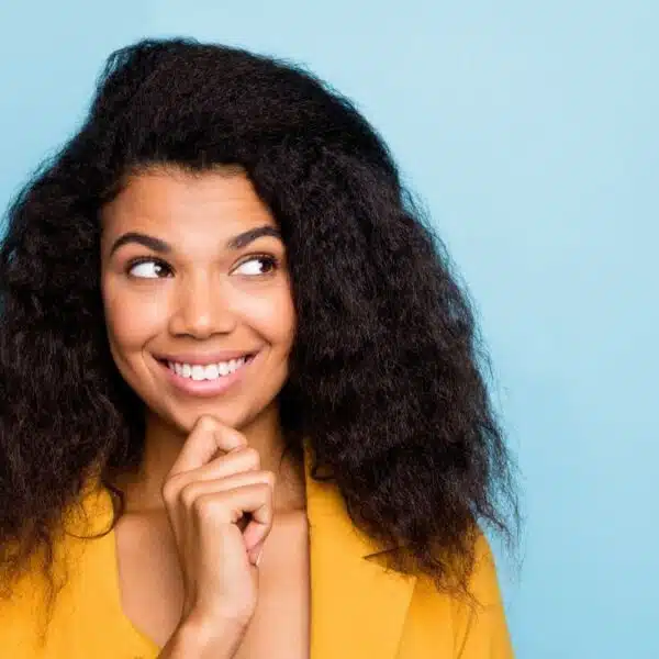 woman black hair thinking