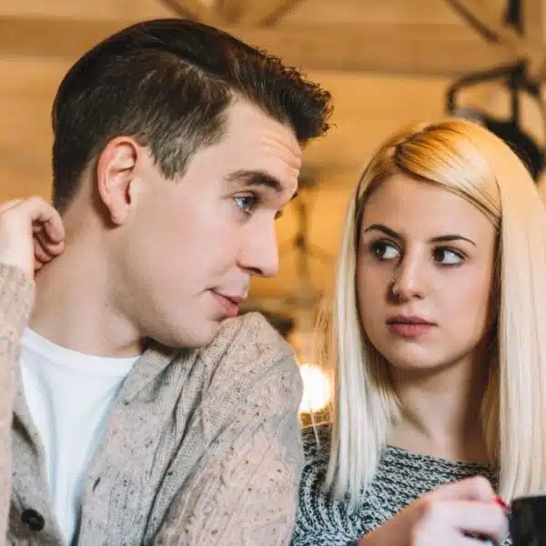 couple talking in a coffee shop
