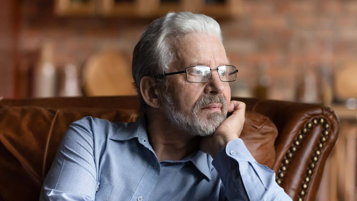 9 Investing Rules People Live By When Self-Managing Their Investments elder man glasses looking out the window