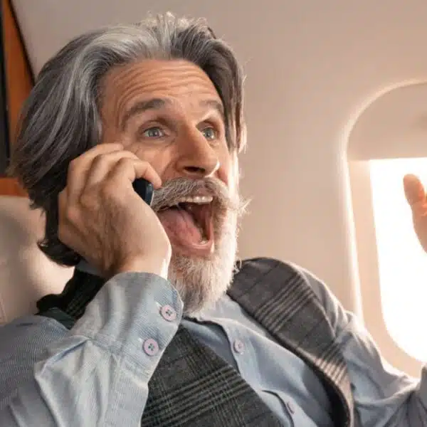 man beard on jet wealth
