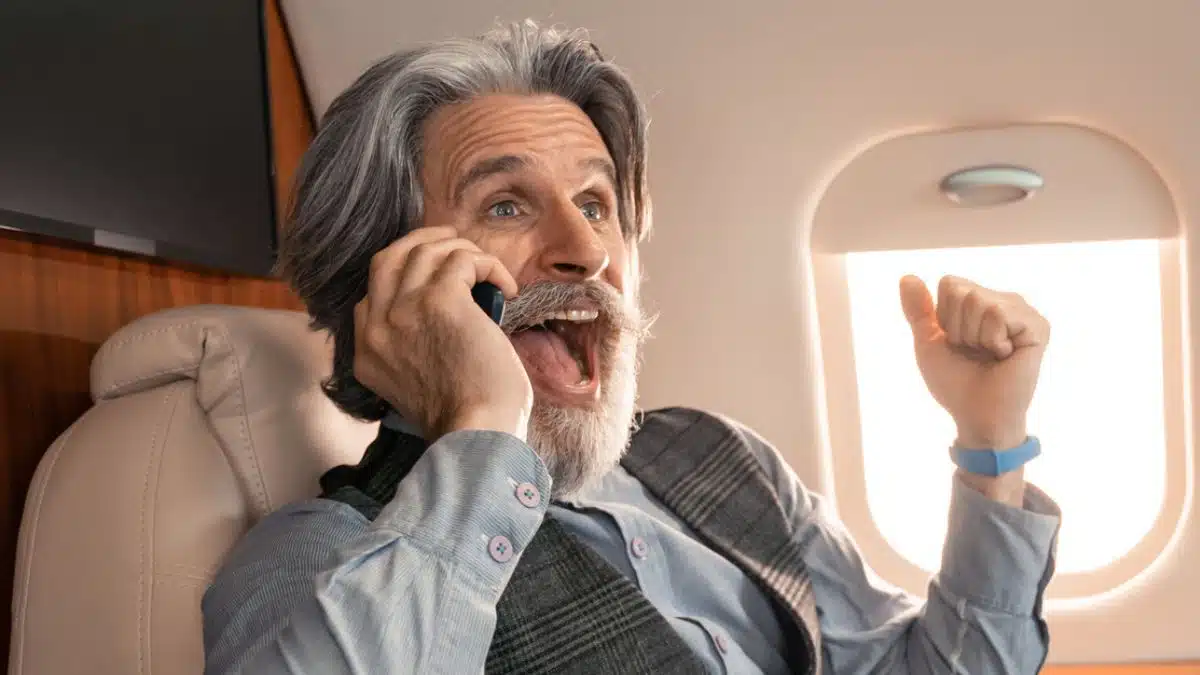 man beard on jet wealth