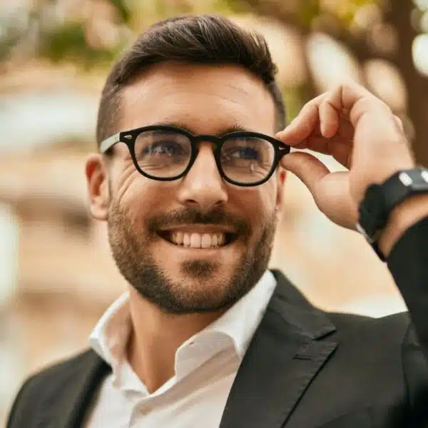 man suit glasses outside