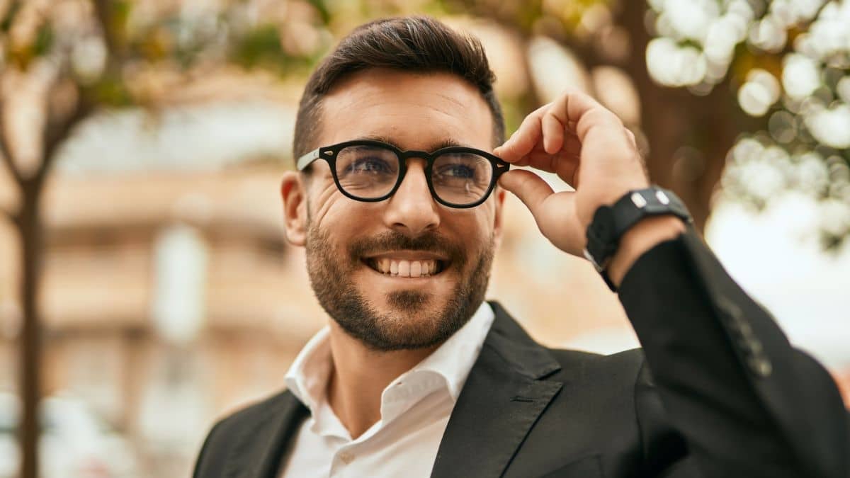 man suit glasses outside