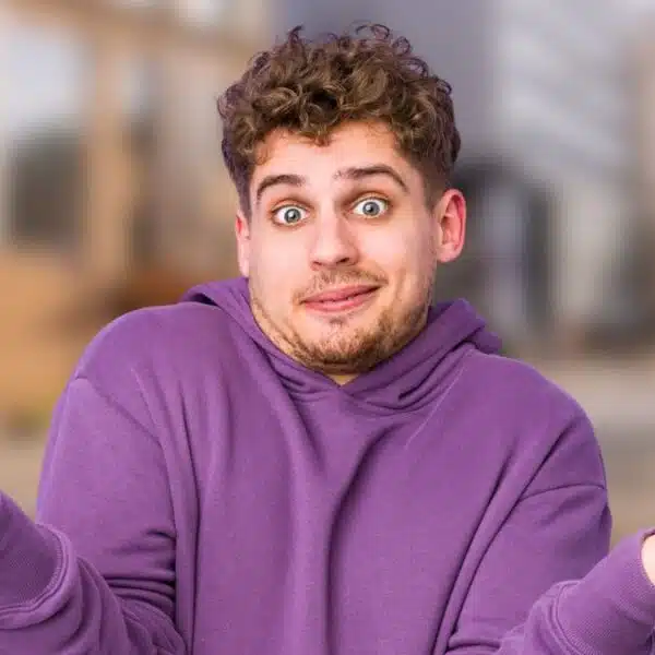 young man confused sweater