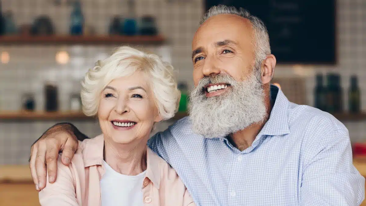 14 Rewarding Side Hustles Retirees Will Actually Enjoy elder couple sitting together