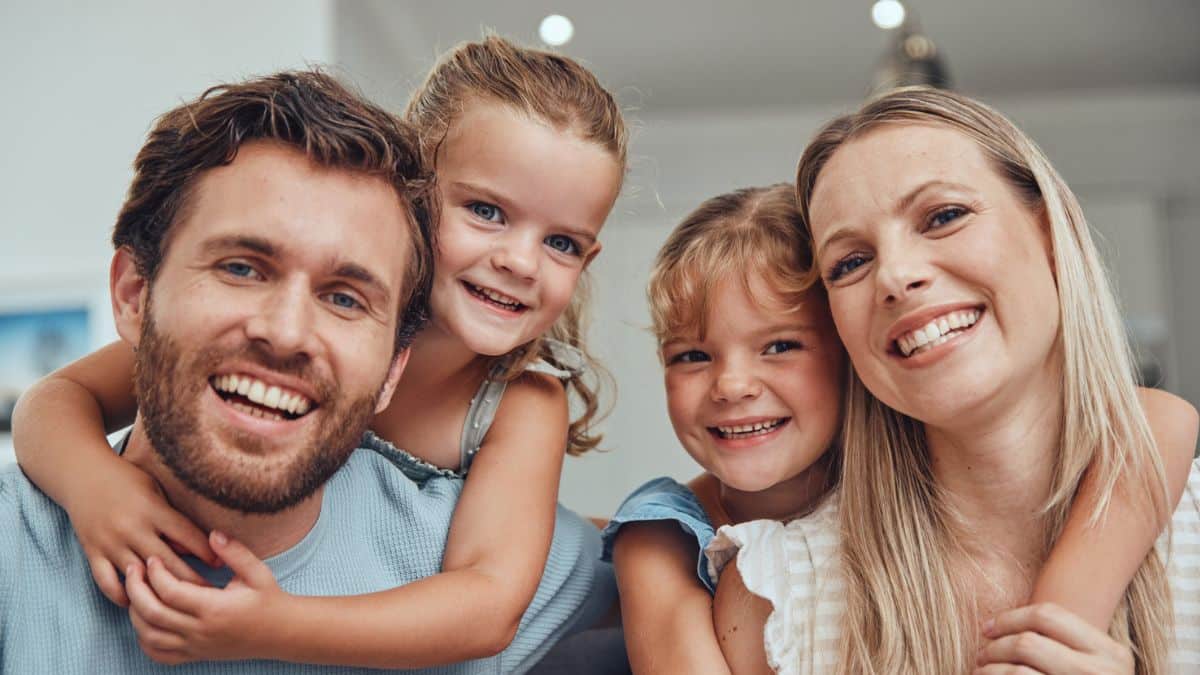 How Rich People Stay Rich Long‑Term family smiling