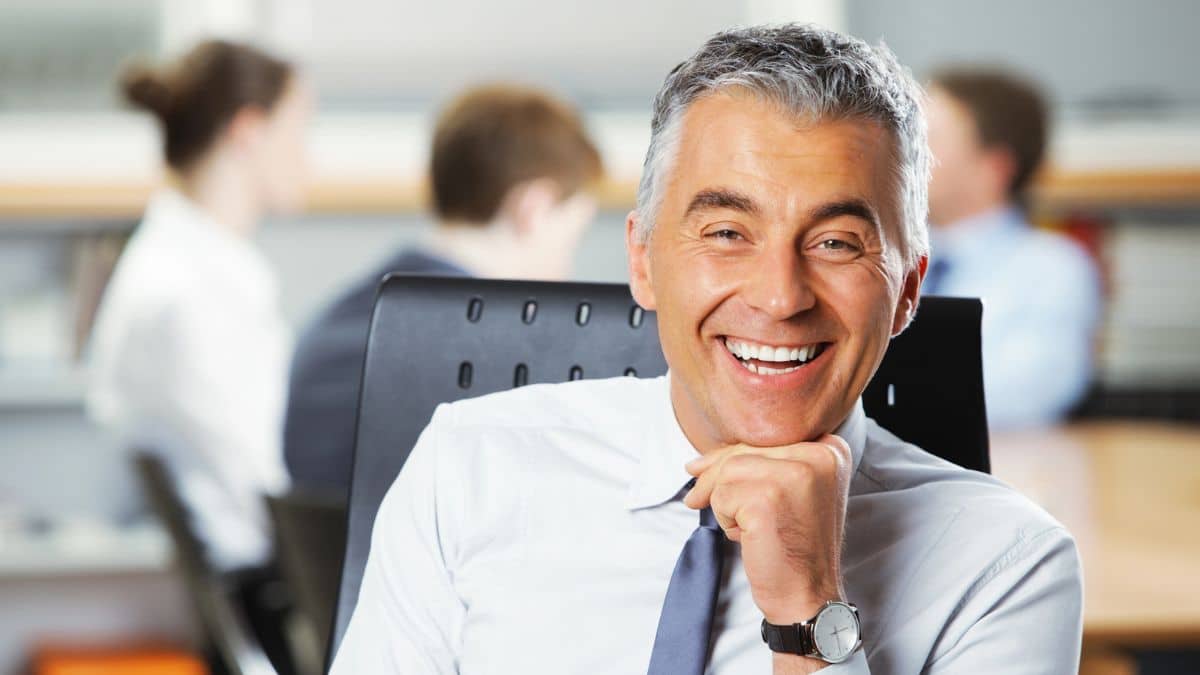 Late‑Start Moves That Can Boost Savings mature employee laughing