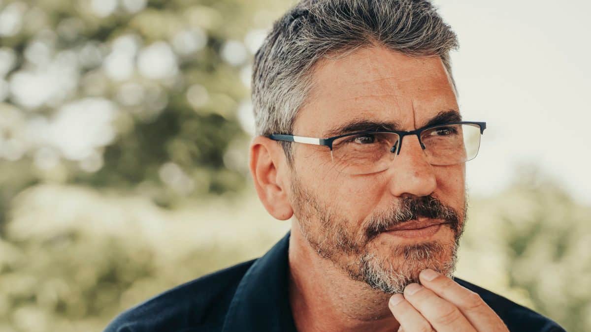 Signs That Can Predict Real Wealth mature man glasses thinking