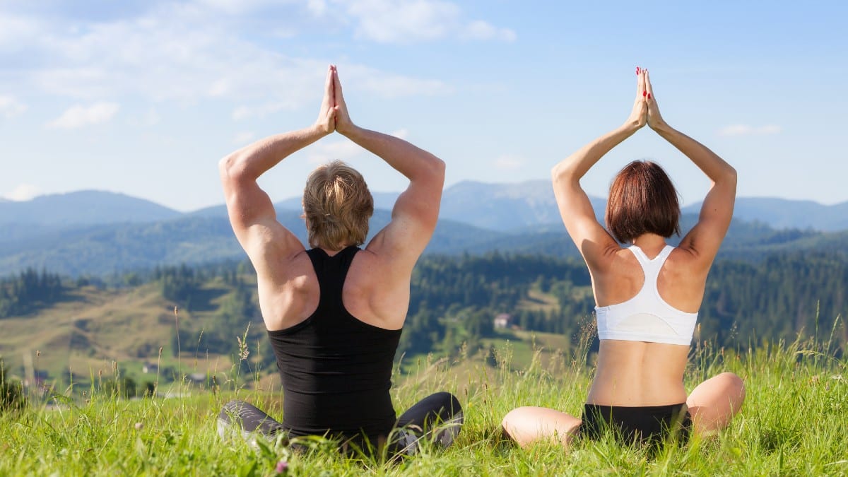 Ways Creators Can Turn Ideas Into Income Beautiful-young-woman-and-man-doing-yoga-exercise-2