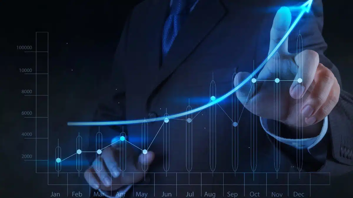 18 Moves That Can Make Your $5K Work for You Businessman-hand-touch-virtual-chart-business