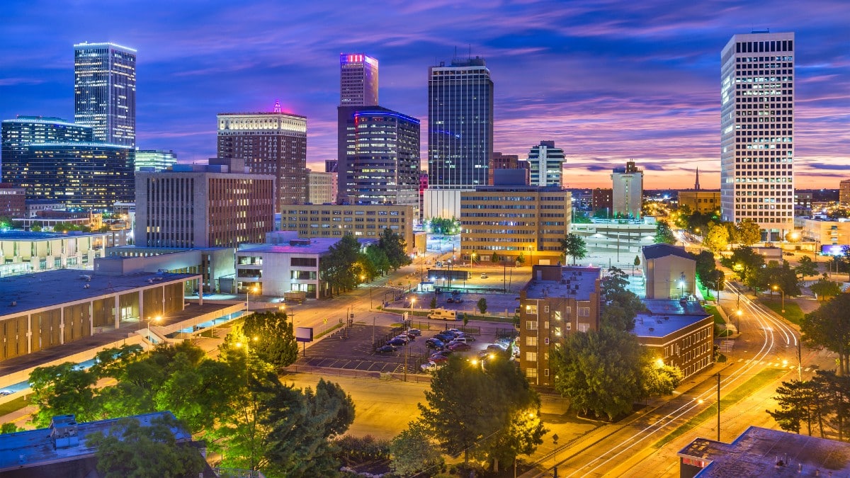13 Affordable Cities That Ease Financial Stress Tulsa-Oklahoma-USA-skyline-at-twilight