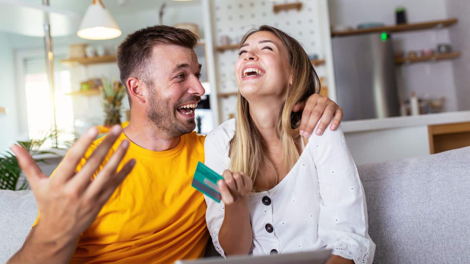 10 Money Habits That Strengthen Your Marriage couple-laughing-with-one-another