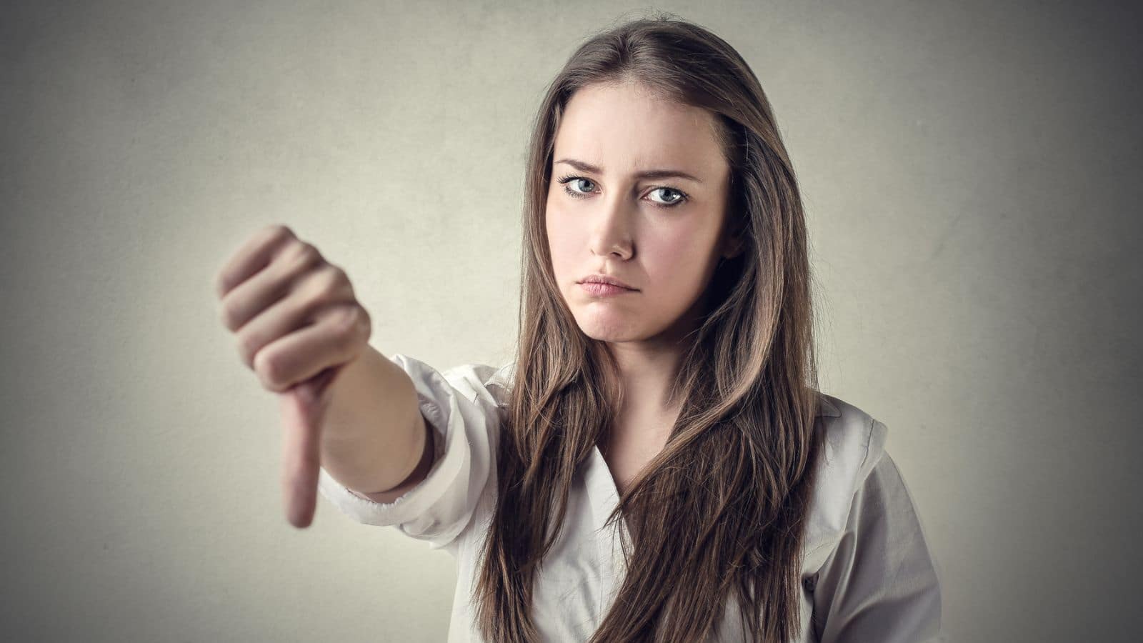 17 Ways to Handle Narcissists at Work Gracefully woman-with-a-thumbs-down
