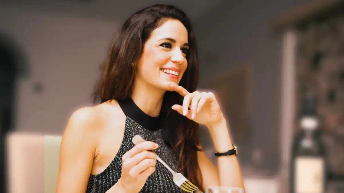 rich woman eating a meal