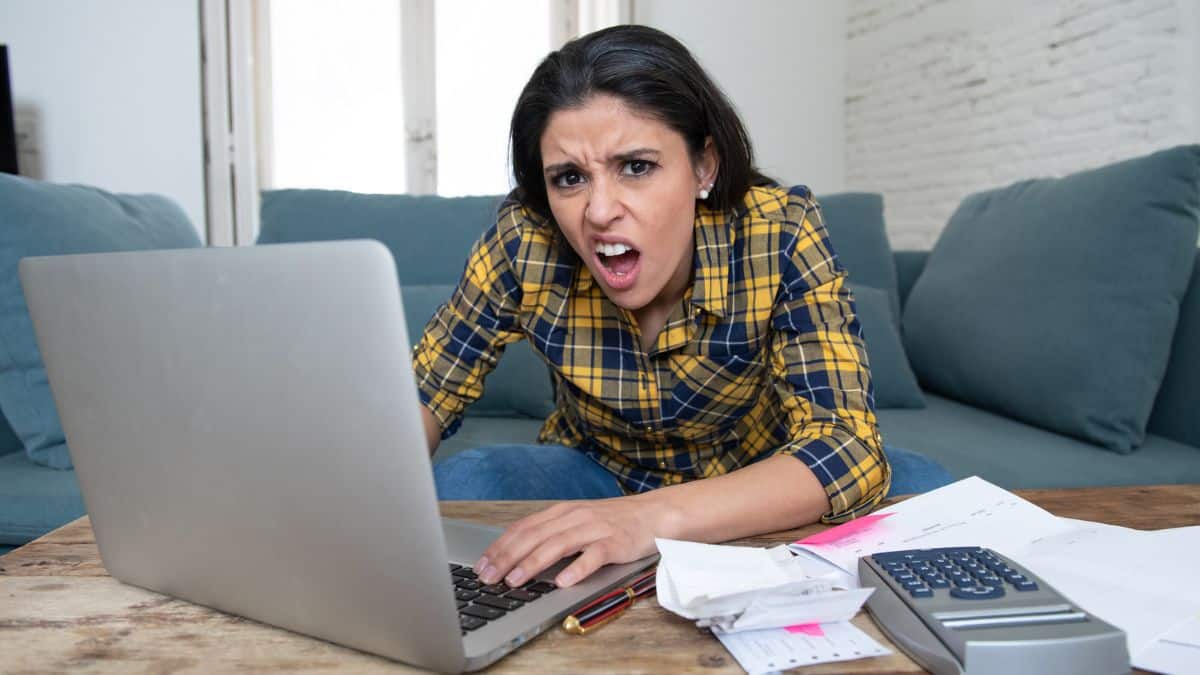 Middle‑Class Habits That Can Build Security woman-mad-doing-bills