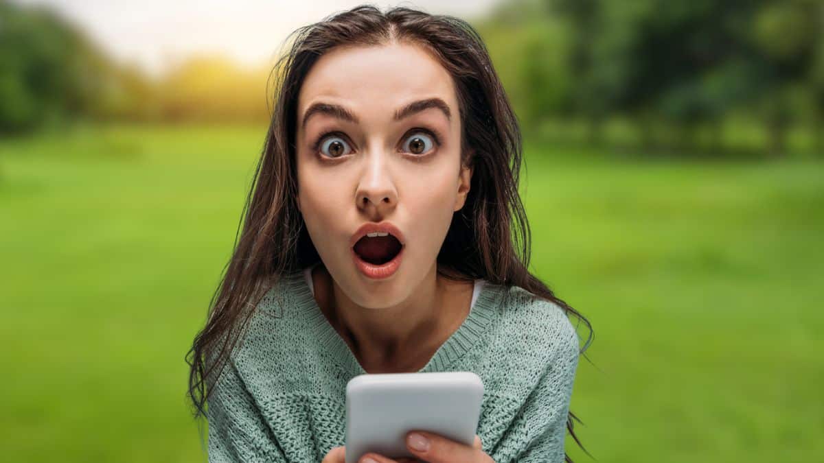 High‑Earning Creative Gigs Anyone Can Start woman-shocked-on-her-phone-in-the-park
