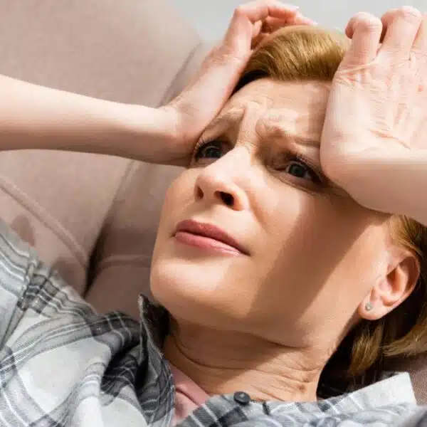 woman stressed out laying down