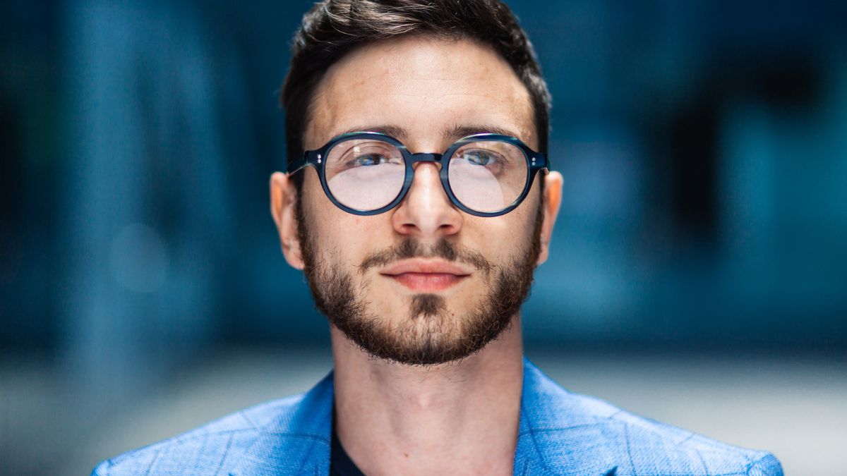 man glasses suit business