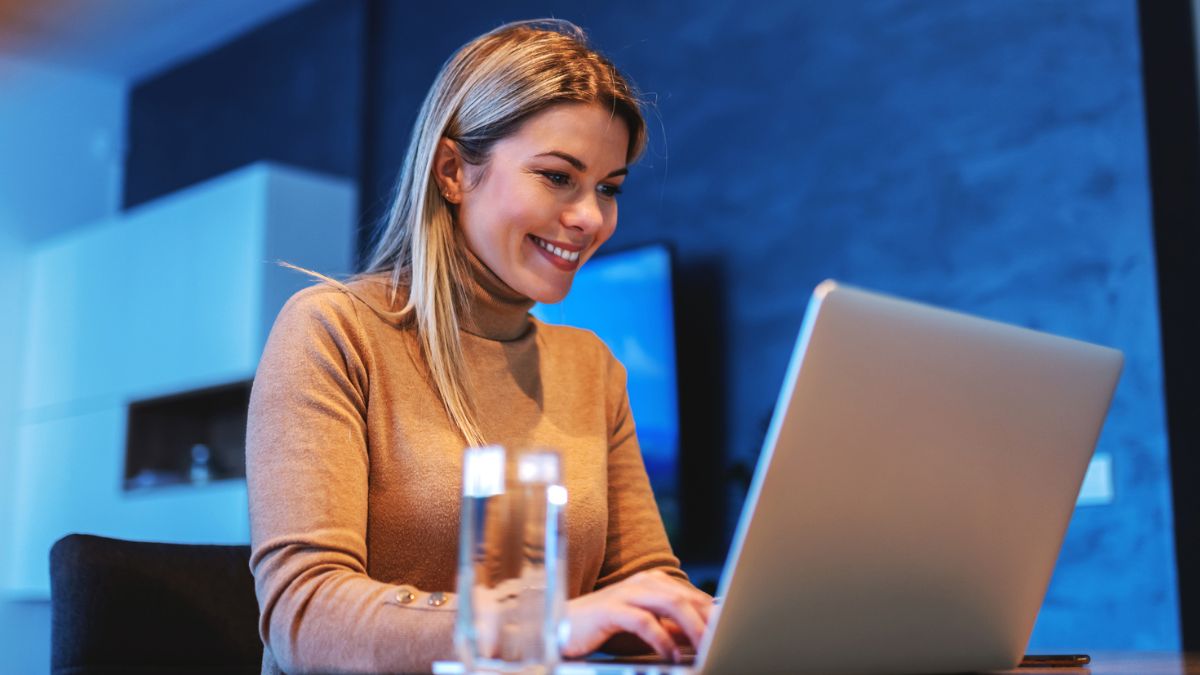 15 Photography Gigs That Pay $3K+ Monthly woman on a laptop