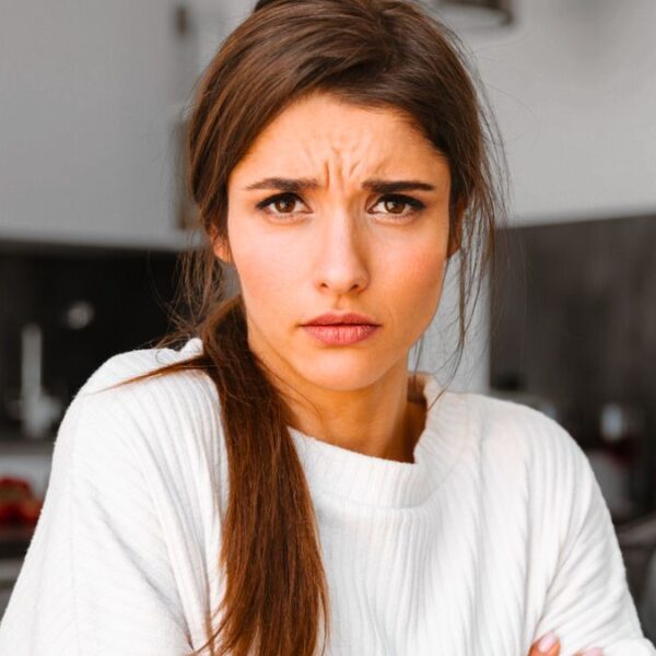 woman at home sad