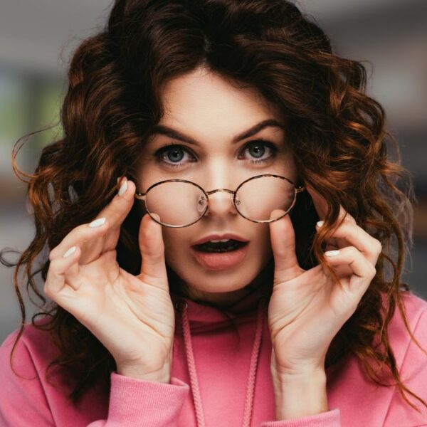 woman glasses shocked surprised