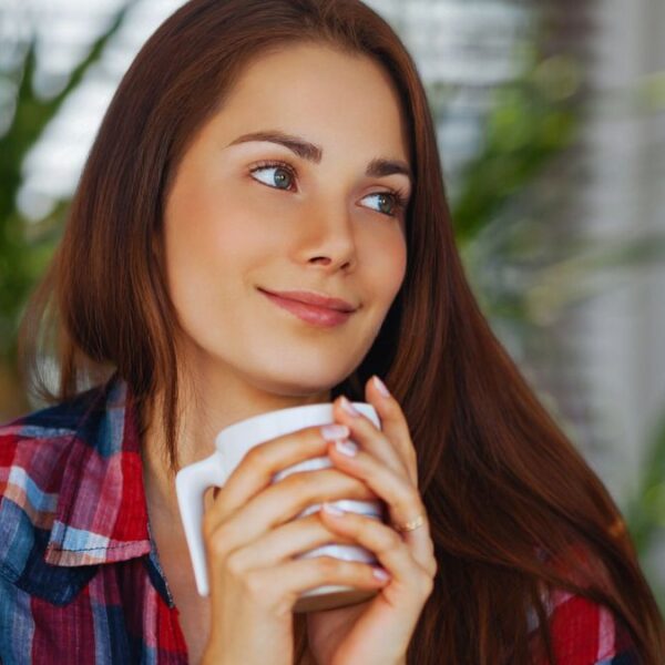 woman holding coffee mug