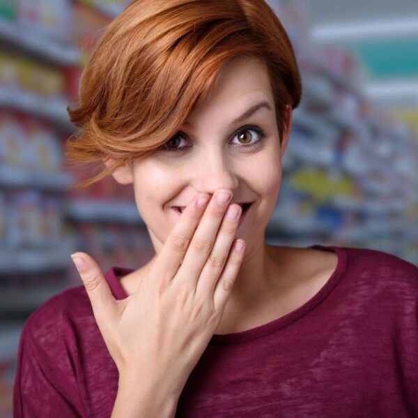 woman secret in grocery store