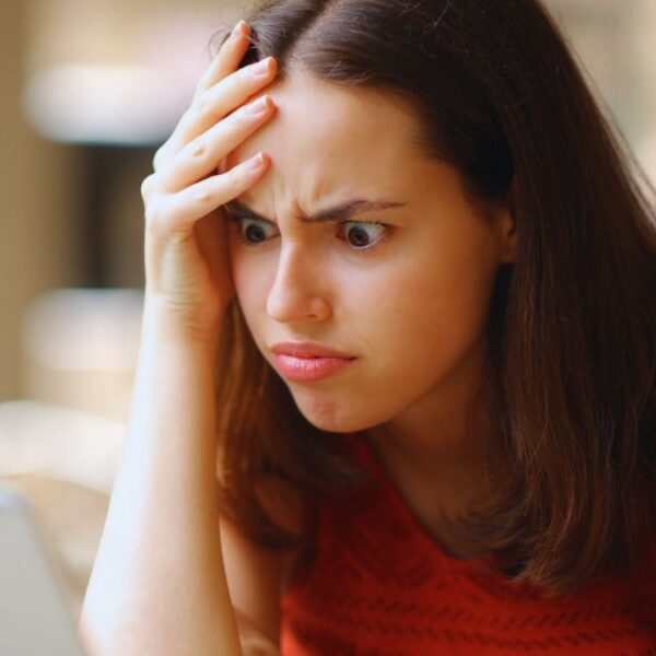 woman worried laptop