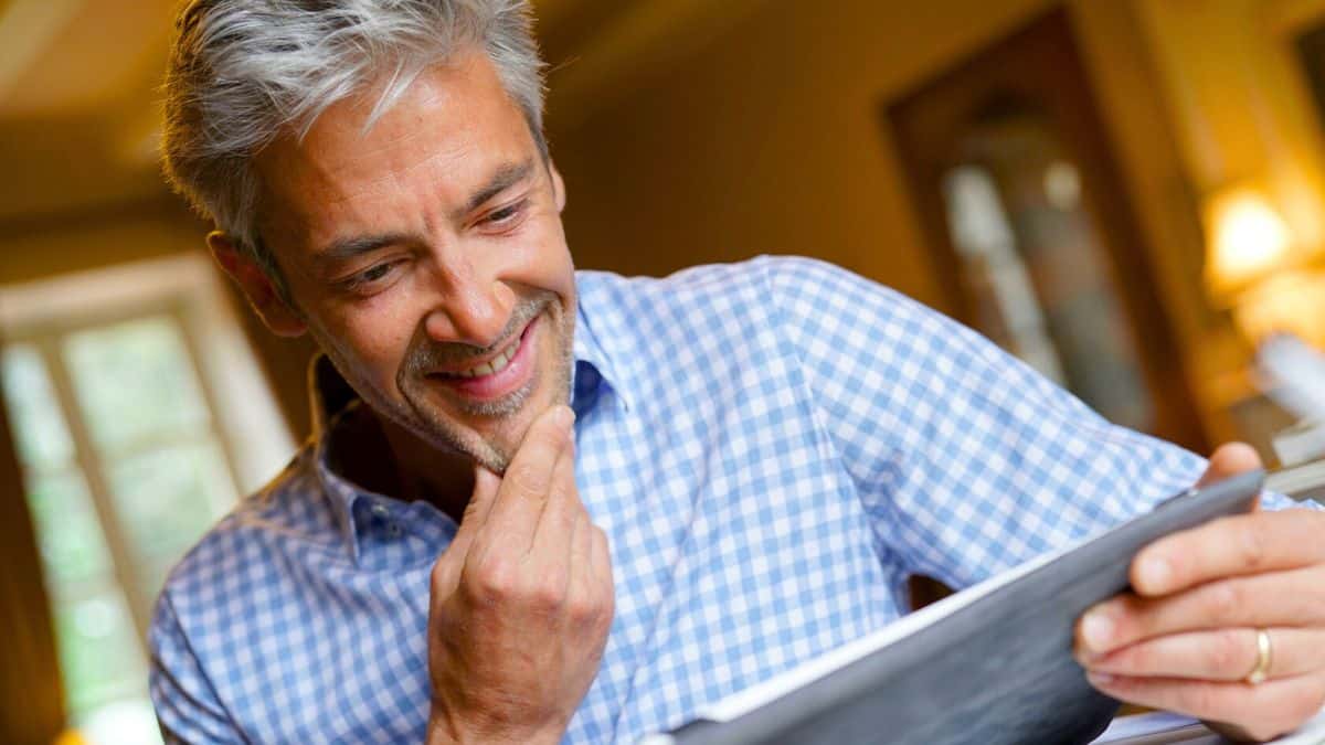 15 Mindset Shifts That Make You Richer businessman tablet