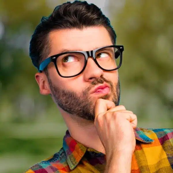 man glasses curious listening