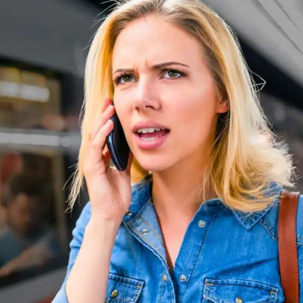 woman phone train talking
