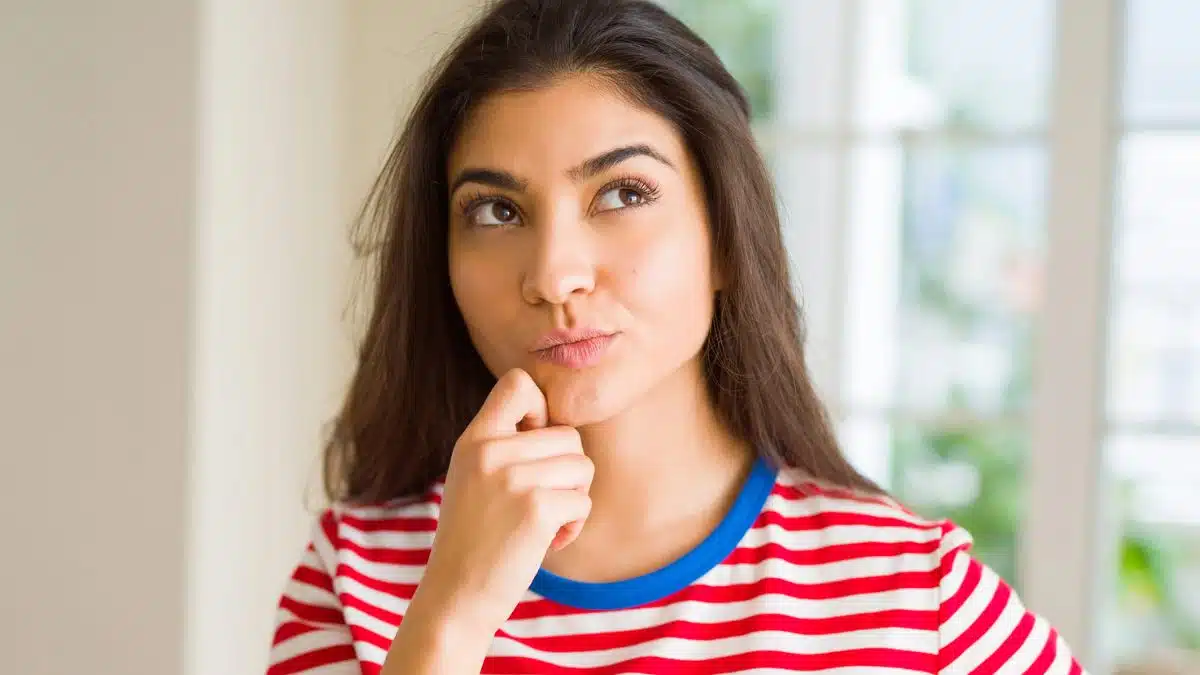woman thinking at home