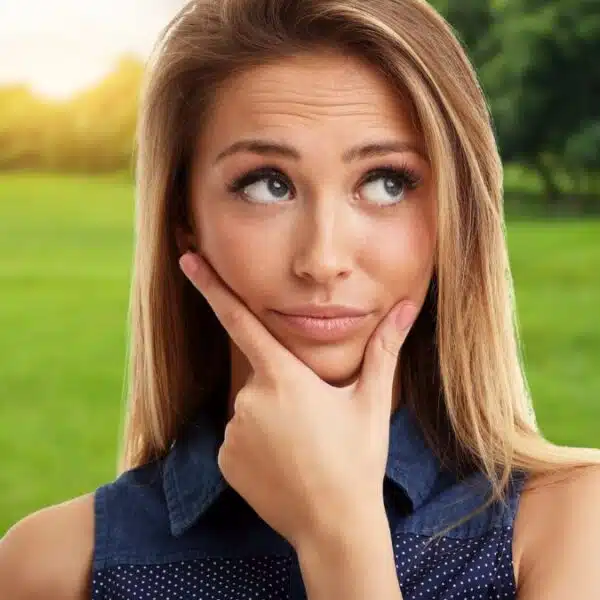 woman wondering thinking at a park