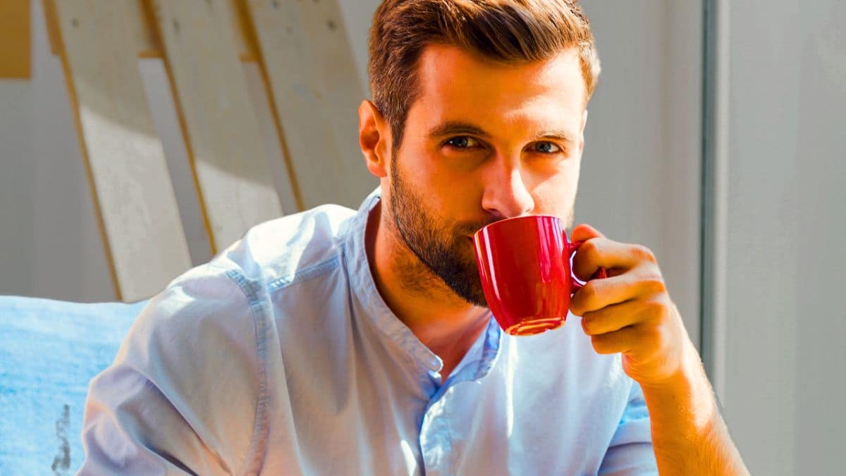 Oversights That Can Sink New Property Hosts man drinking coffee at home