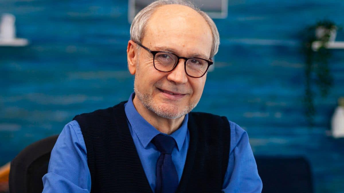 Oversights That Can Sink New Property Hosts senior man smiling glasses and a vest