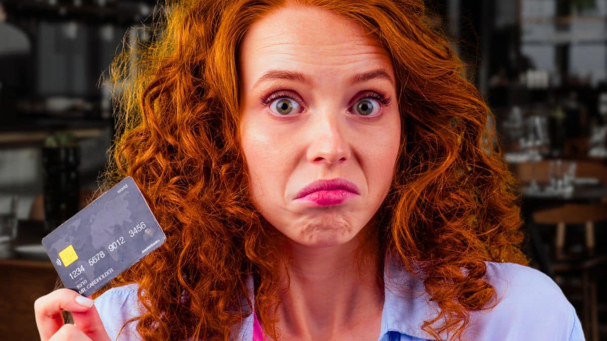 woman credit card stressed