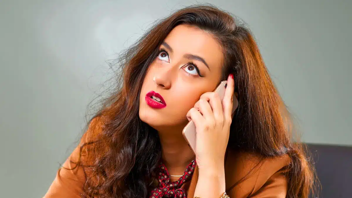 woman phone office worker tired stress